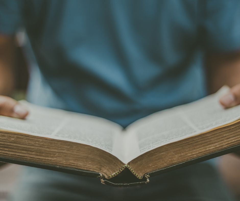 Open Bible symbolizing faith, reflection, and the power of weekly devotion on and off the field.