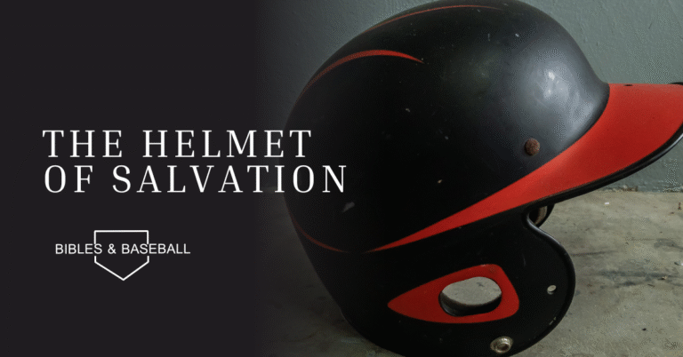 Baseball helmet resting on a dugout floor, symbolizing protection, readiness, and the strength found in God’s salvation.