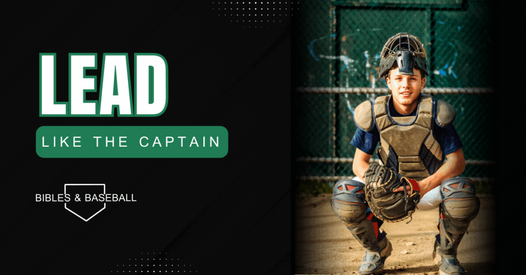 Baseball catcher crouched behind the plate, focused and ready to lead the team from behind the scenes.