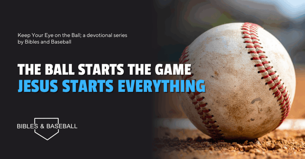 Baseball resting on the dirt before the start of a game with text reading “The Ball Starts the Game – Jesus Starts Everything.”