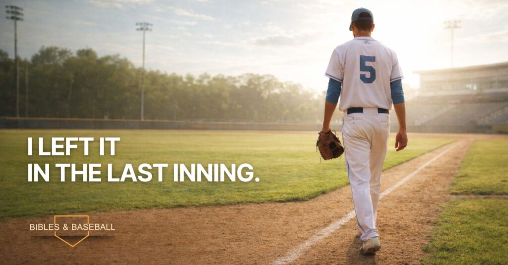 Baseball player wearing number 5 walks alone along the baseline of a sunlit field, holding his glove after the game, symbolizing leaving past mistakes behind.