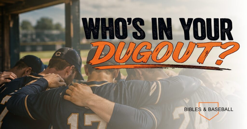 Youth baseball players stand shoulder-to-shoulder in a dugout during a team prayer or huddle, with the devotional title “Who’s In Your Dugout?” displayed prominently in bold black and orange lettering alongside the Bibles & Baseball logo.