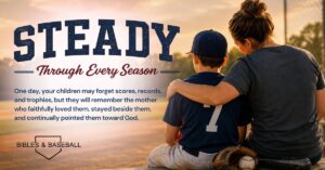 A mother sits beside her son in a baseball uniform on bleachers at sunset, arm around him as they overlook a baseball field. The image includes the devotional title “Steady Through Every Season” and a message about faithful motherhood and pointing children toward God.